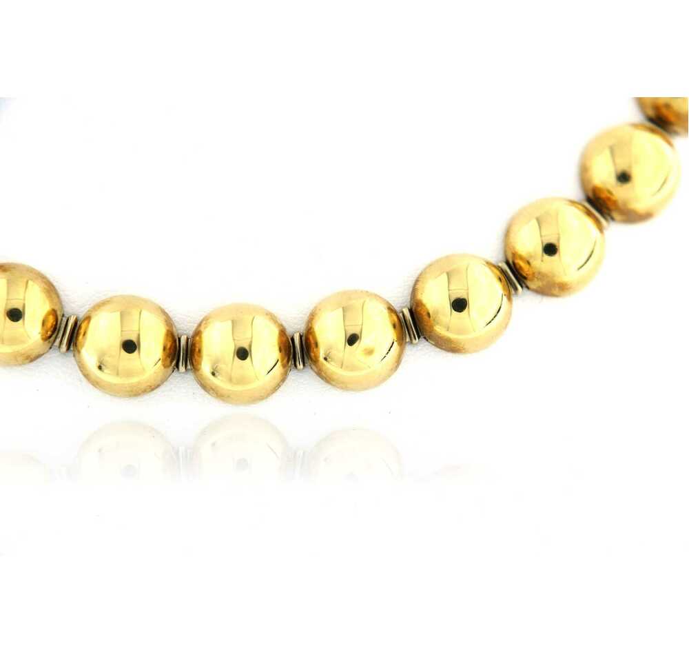 Gouden halsketting met halve bollen
