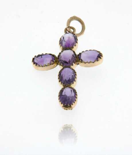 Yellow gold cross with amethysts