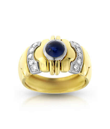Yellow gold ring with Sapphire cabochon and 10 brilliants
