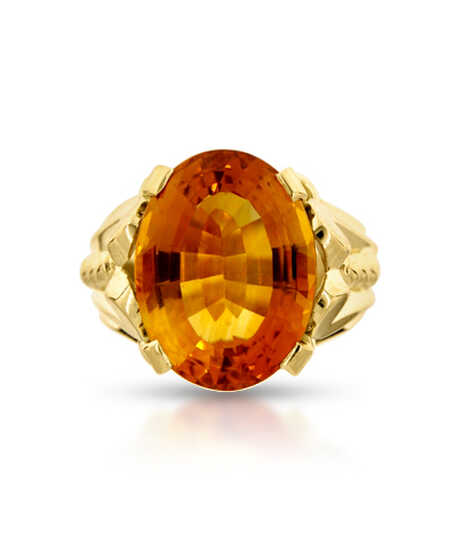 Yellow gold ring with topaz