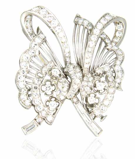 Platinum decorative pin in butterfly shape set with 8/8-cut diamonds and baguettes