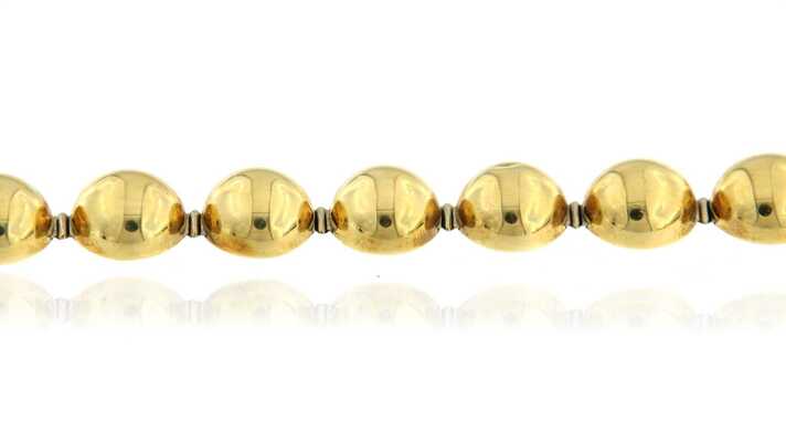 Gouden halsketting met halve bollen