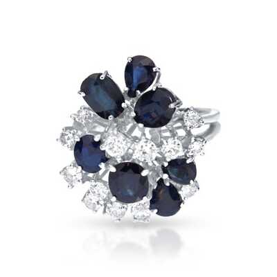 Ring in white gold decorated with a bouquet of 7 dark blue sapphires and 14 diamonds