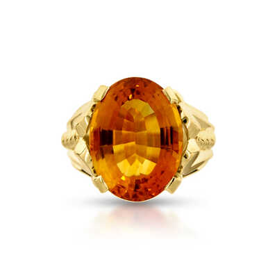 Yellow gold ring with topaz