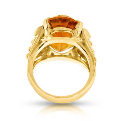 Yellow gold ring with topaz
